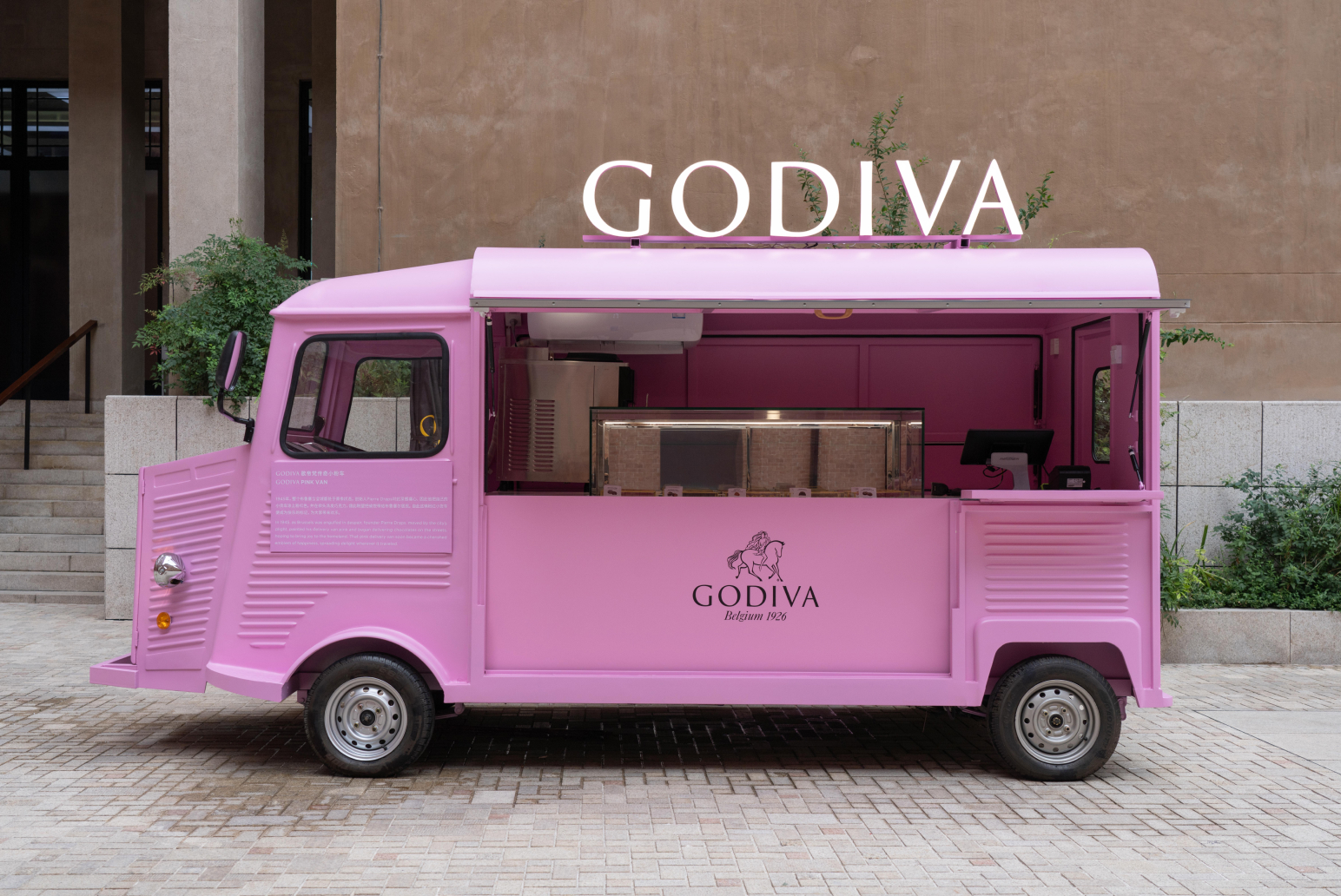 GODIVA pink van